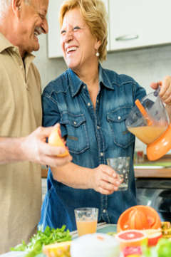 senior couple making a healthy meal