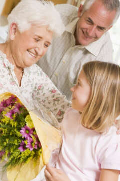 young girl visiting her grandmother at a nursing home