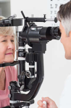 Senior woman having an eye exam