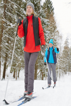 older couple skiing