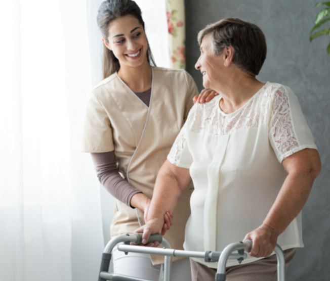 nurse helping patient walk