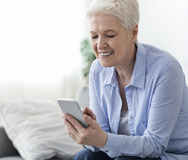 older woman using smartphone