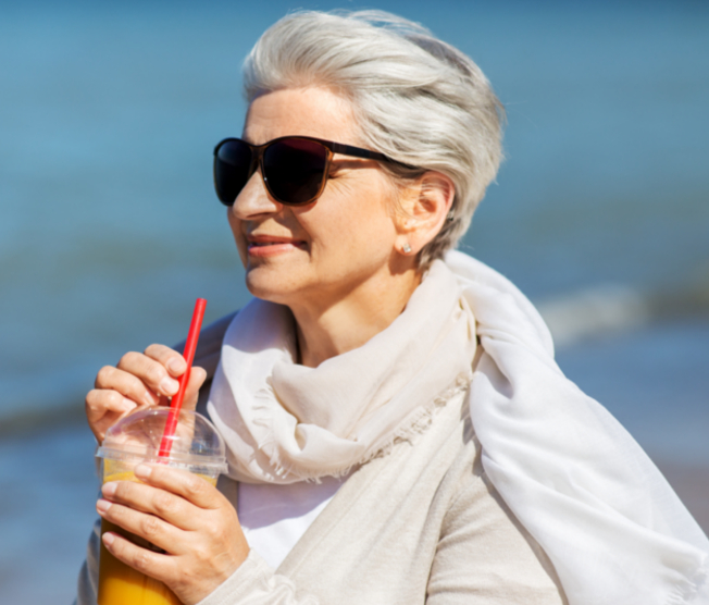 senior woman drinking smoothie