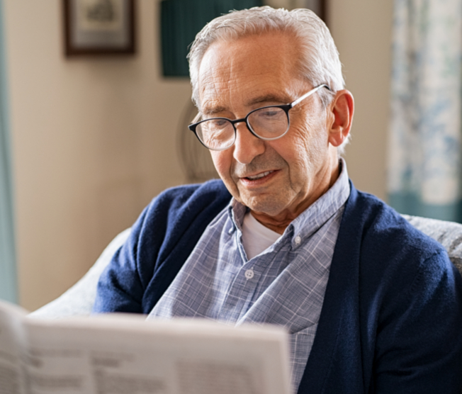 man reading newspaper