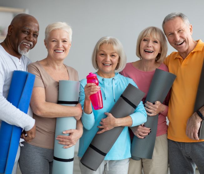 group of seniors at yoga class