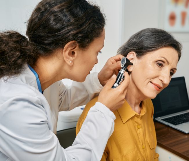 hearing exam for senior woman